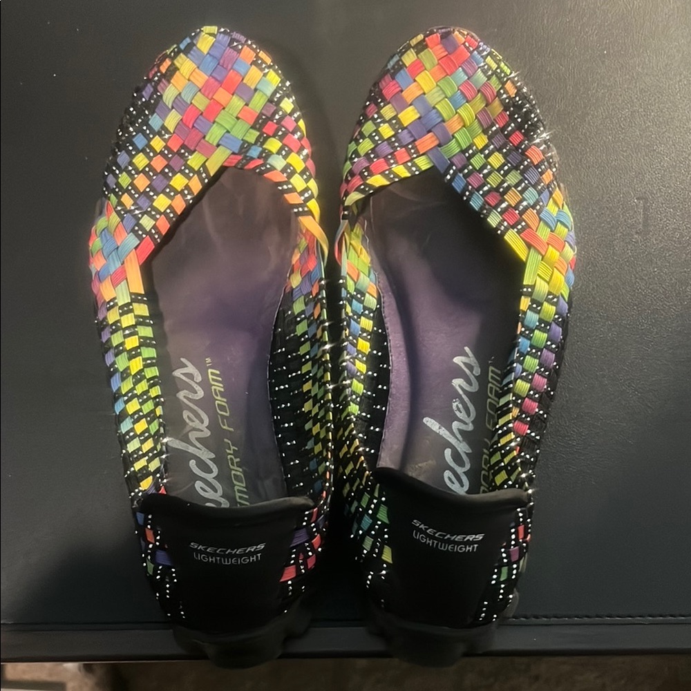 Skechers Black Flats & Loafers with Sleek Design